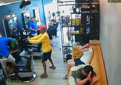 VÍDEO: Criminosos invadem barbearia, causam pânico e atiram em policial